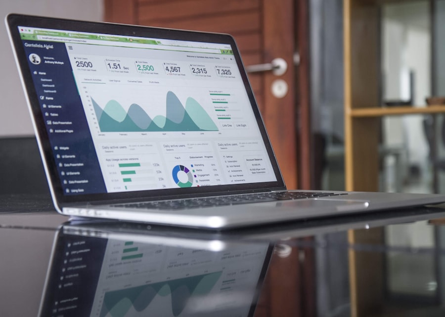 A South African small-business owner reviewing a live dashboard on their laptop, tracking revenue and costs in real time